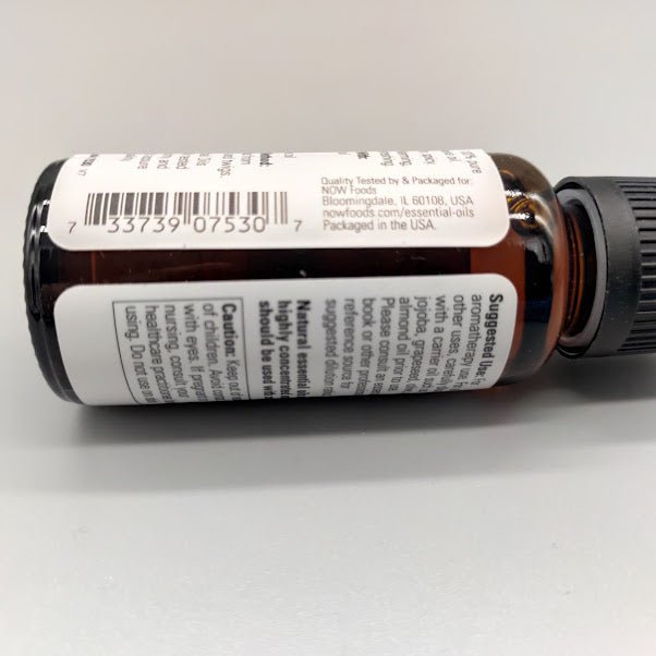 Bottom of the NOW cinnamon cassia bottle: barcode and packaged for NOW Foods, Bloomingdale, IL