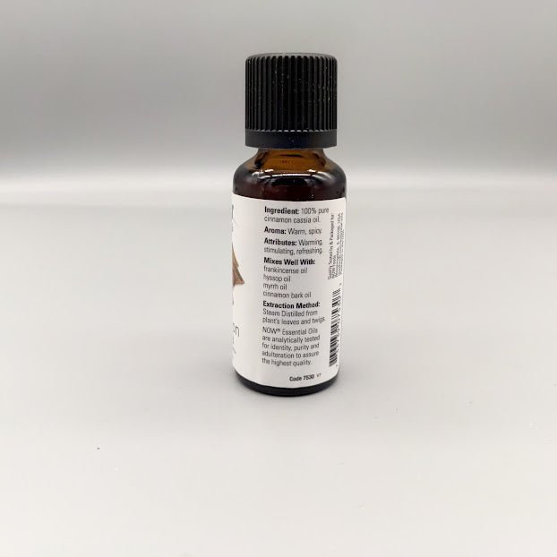 Side of the NOW cinnamon cassia bottle: ingredient, aroma, attributes, mixes well with and extraction
