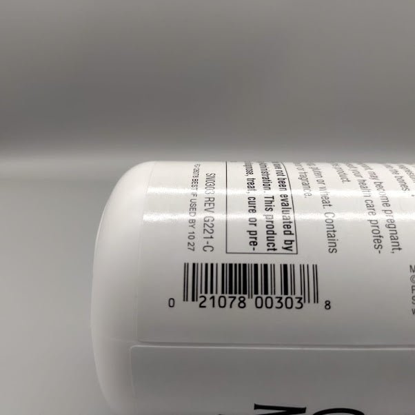 Calcium and Magnesium - Amino Acid Chelate with Vitamin D-3 - 300mg - 100 Tablets - Source Naturals (foto de archivo)