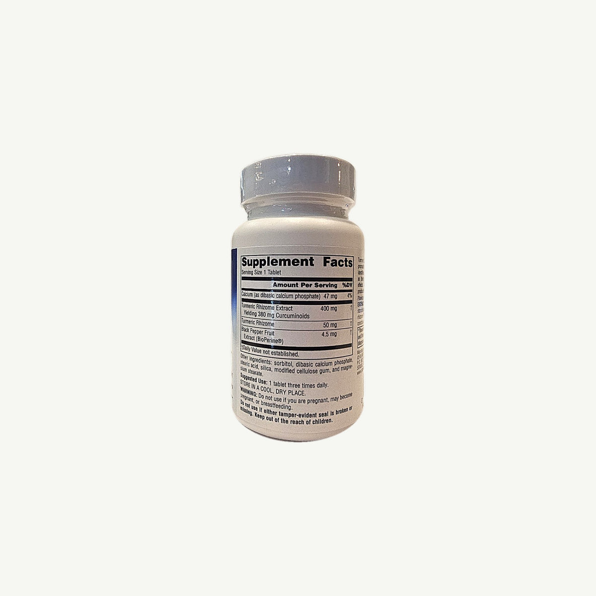 Foto real del panel del frasco de Extracto de Cúrcuma Planetary Herbals: Supplement Facts, uso y advertencias