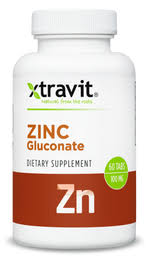 Frasco de zinc gluconato Xtravit de 14 mg con 60 tabletas — etiqueta con los ingredientes