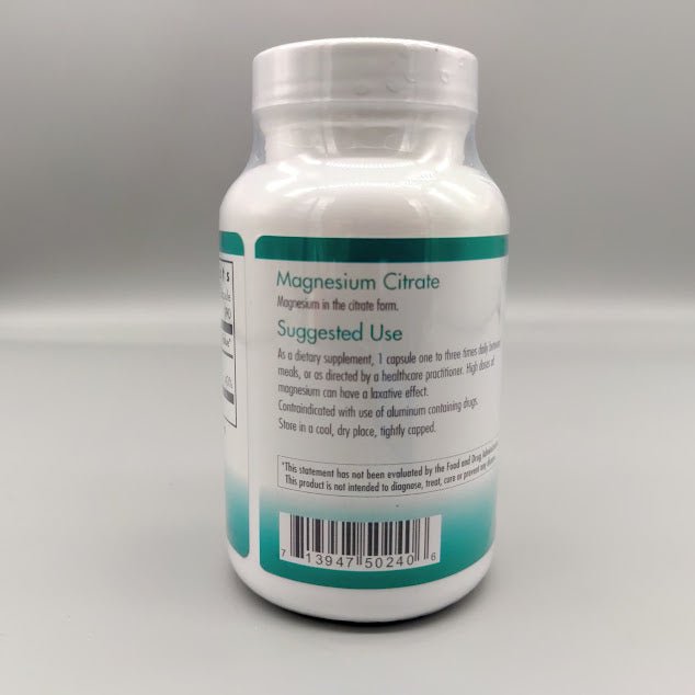 Lado del frasco Magnesium Citrate NutriCology: Suggested Use, laxative effect, aluminum, nota de la FDA y código
