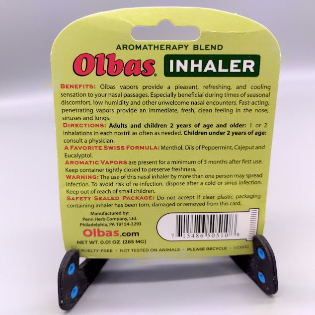 Back of the Olbas Inhaler card: Benefits, Directions, menthol, peppermint, cajeput and eucalyptol formula, warnings
