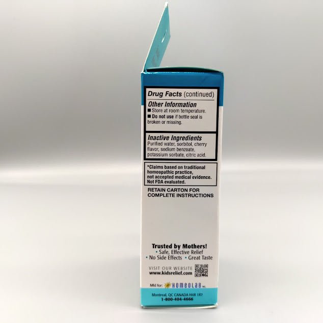 Pain & Fever Cherry .85 OZ de Kids Relief — vista lateral (foto de archivo)