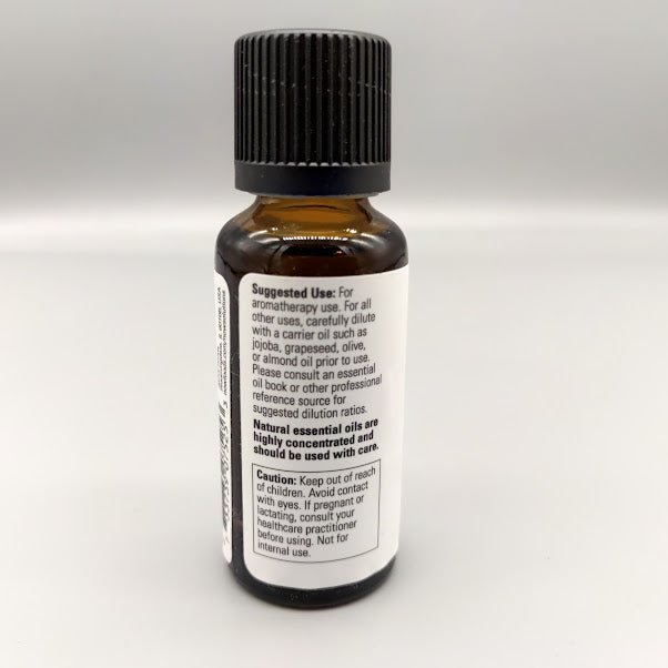 Back of the NOW spearmint bottle: suggested use, carrier oil dilution and caution