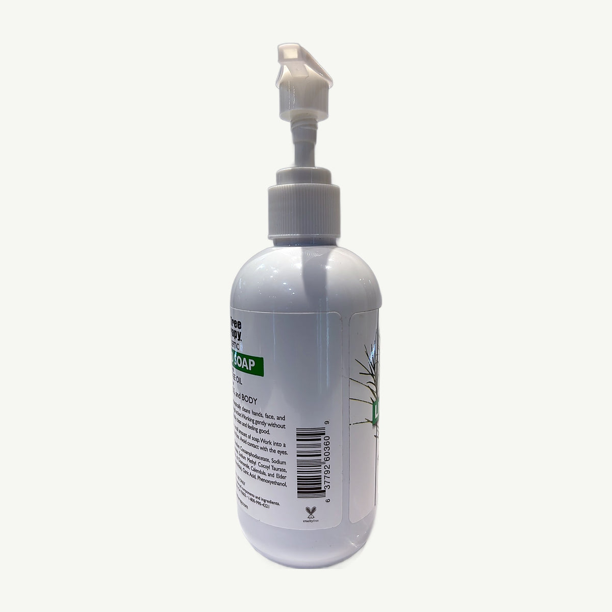 Lado del frasco de jabón líquido Tea Tree Therapy 8 fl oz con el código de barras y el sello cruelty free