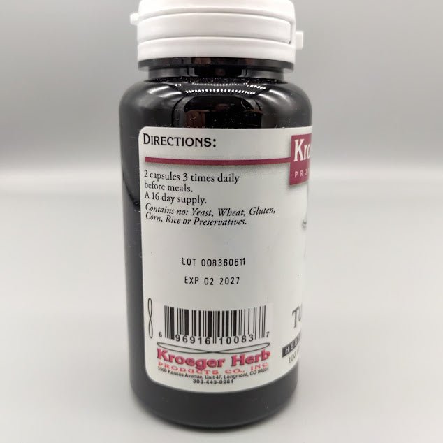 Alivio Natural para el Dolor con Cúrcuma Kroeger Herbs — vista posterior (foto de archivo)