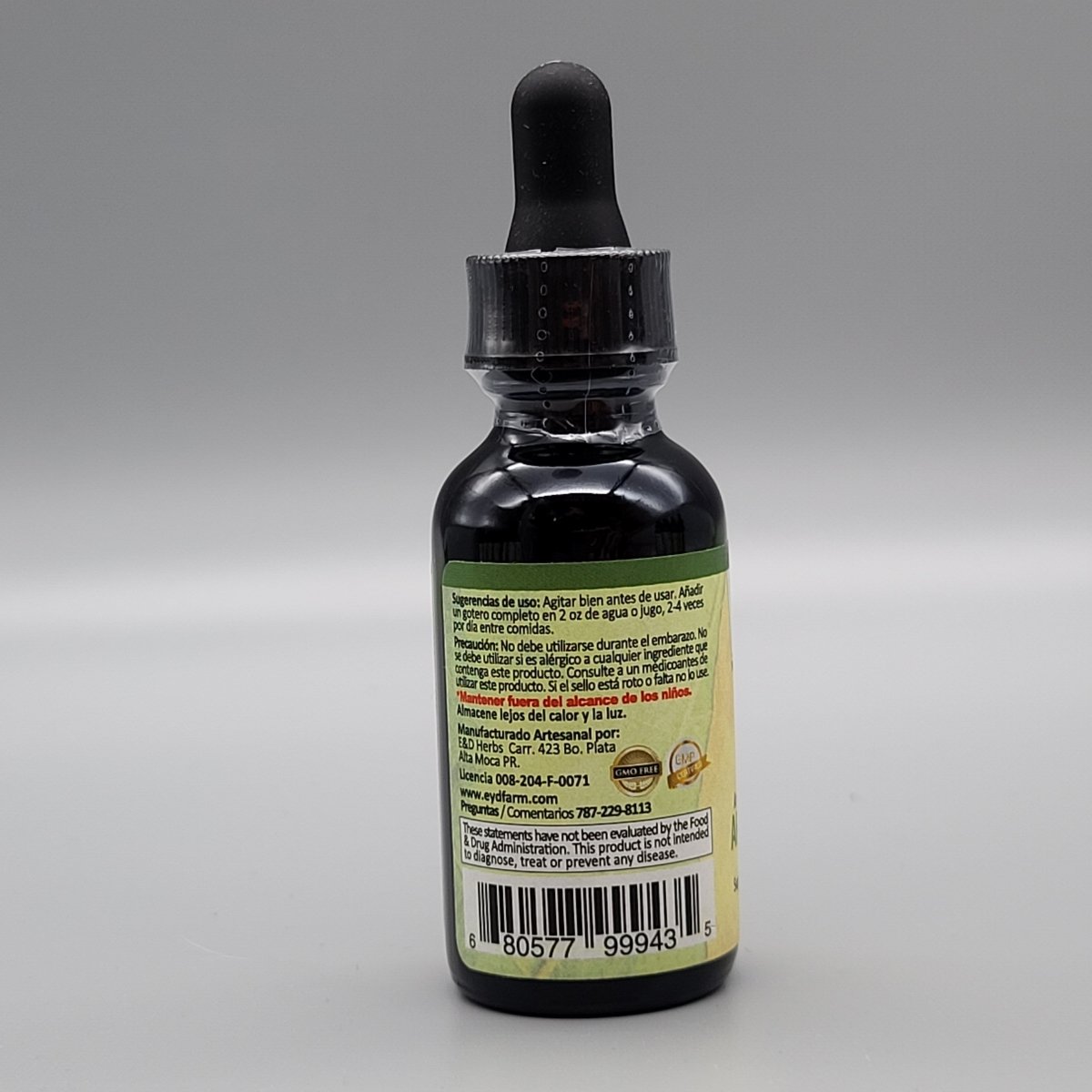 Artemisia - Liquido - Gotas - 1oz de E & D Herbs — vista posterior del envase (foto de archivo)