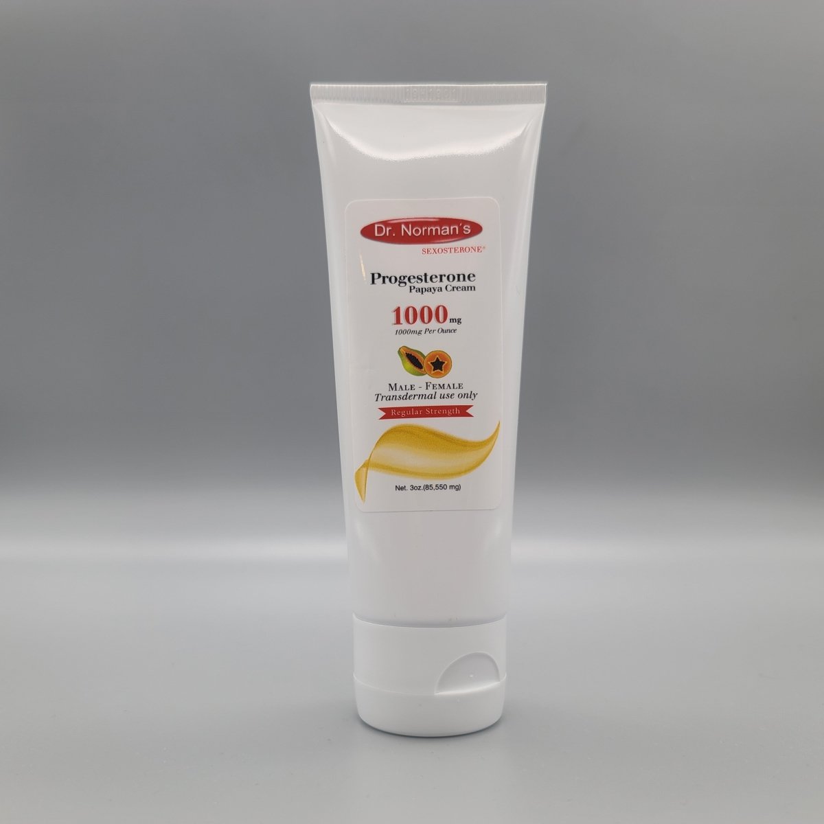 Frente del tubo: Dr. Norman's Progesterone Papaya Cream, Male - Female, 1000 mg por onza, 3 oz (foto de archivo)