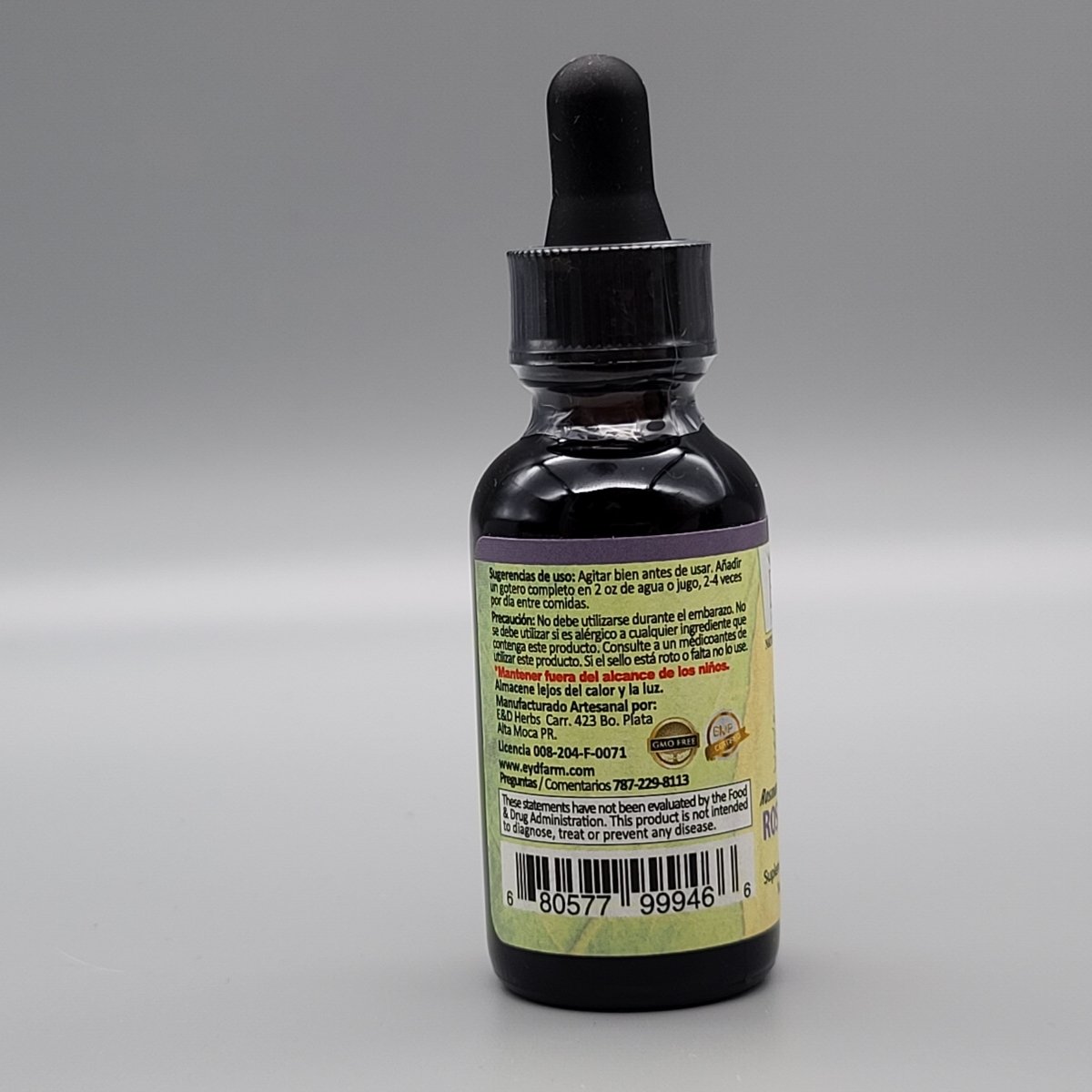 Costado del frasco de romero E&D Herbs: sugerencias de uso, precaución, fabricante en Moca, PR, y aviso de la FDA