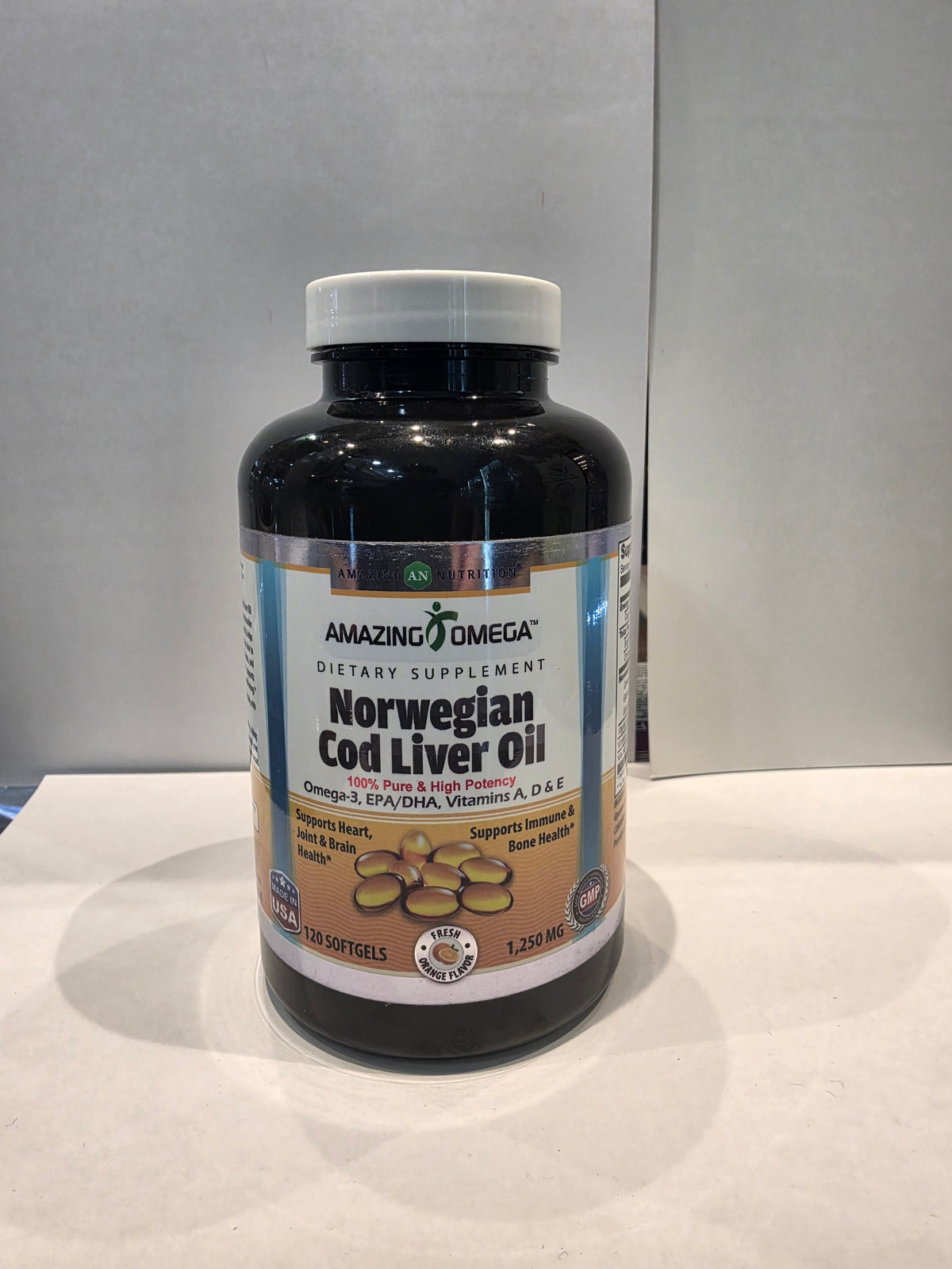 Aceite de Hígado de Bacalao Amazing Omega 1250 mg 120 softgels, frente (foto de archivo)