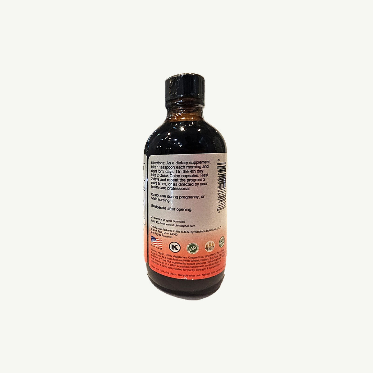 Foto real del lado de VF Syrup: instrucciones, aviso de embarazo, refrigerar, fabricante, sellos y declaraciones